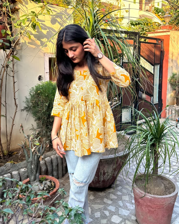 Komal, co-founder, wearing one of the kurtis